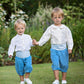 Pageboys in Blue Knickerbockers by Amelia Brennan Weddings