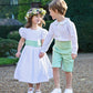 Pageboy and Flowergirl outfits in white and green linen by Amelia Brennan Weddings